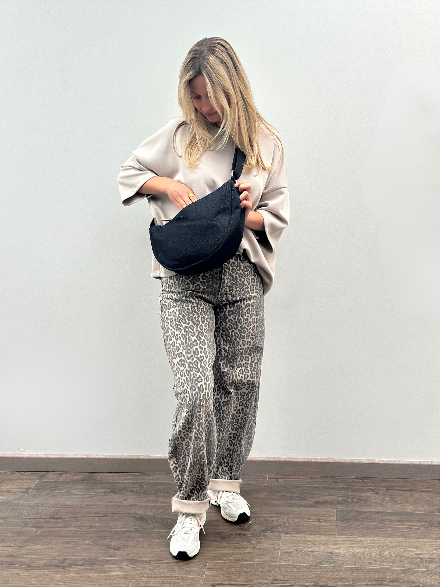 Afgeronde heuptas zwarte Jeans