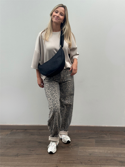 Afgeronde heuptas zwarte Jeans